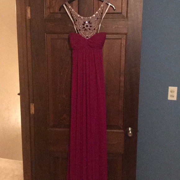 Fuchsia gown from David’s Bridal. - Picture 1 of 3